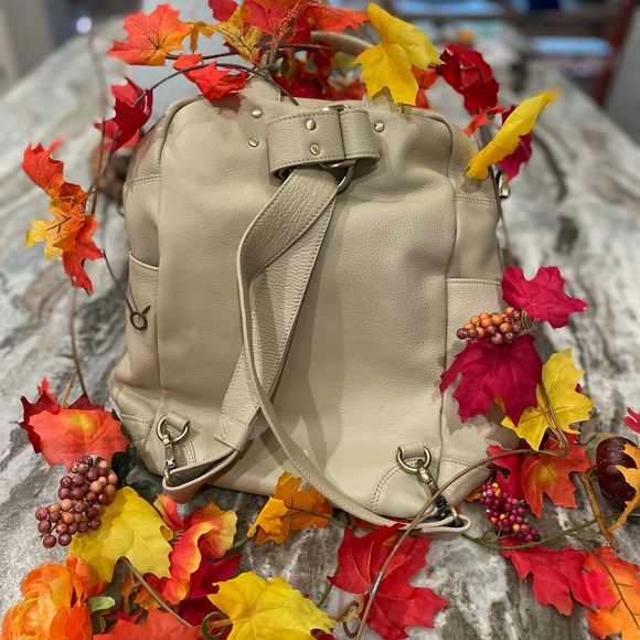 Chic Cream Backpack with Gold Accents